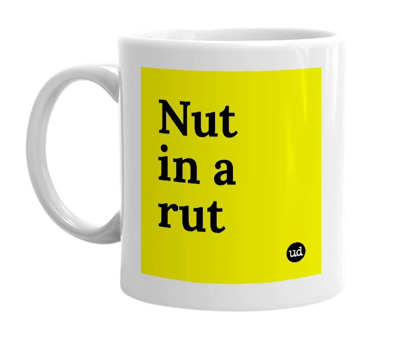 White mug with 'Nut in a rut' in bold black letters