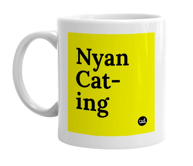 White mug with 'Nyan Cat-ing' in bold black letters