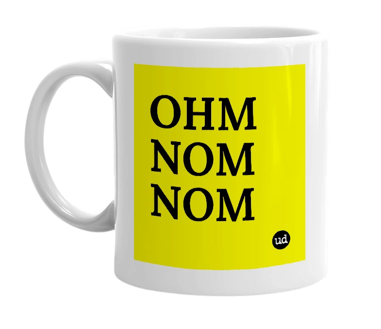 White mug with 'OHM NOM NOM' in bold black letters