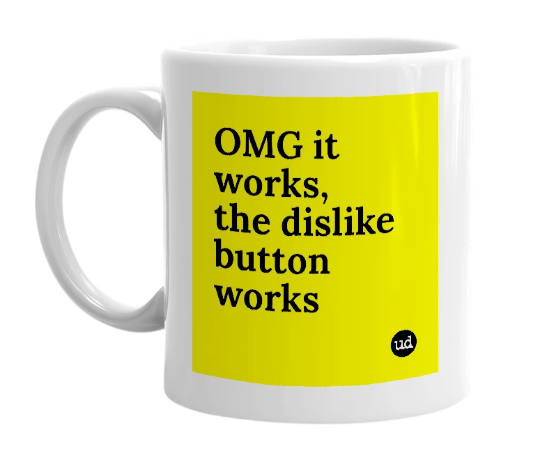 White mug with 'OMG it works, the dislike button works' in bold black letters