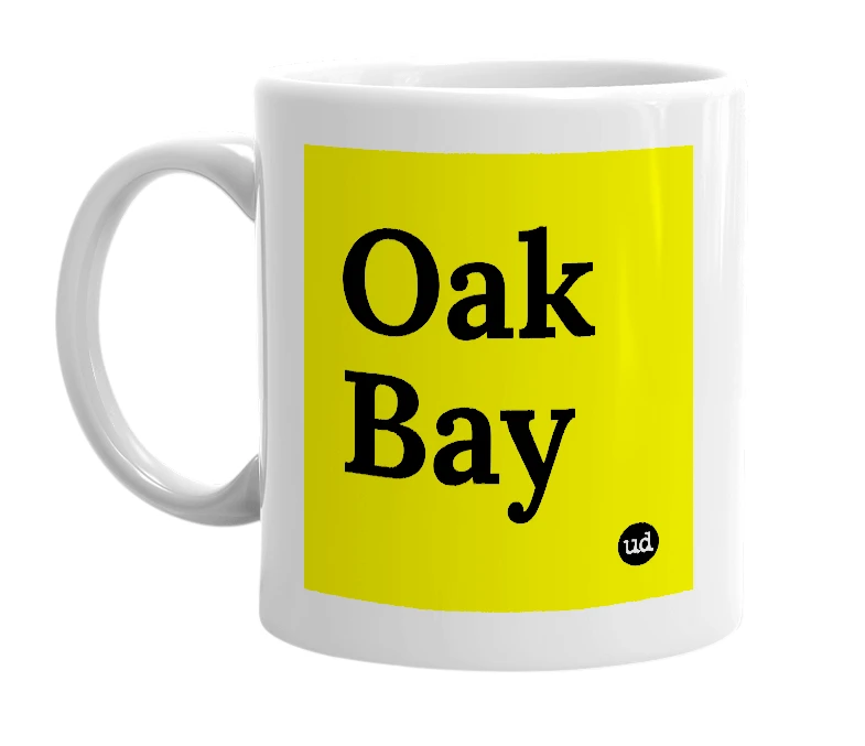 White mug with 'Oak Bay' in bold black letters