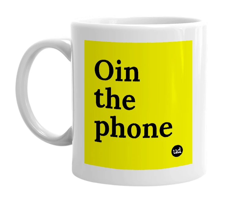 White mug with 'Oin the phone' in bold black letters
