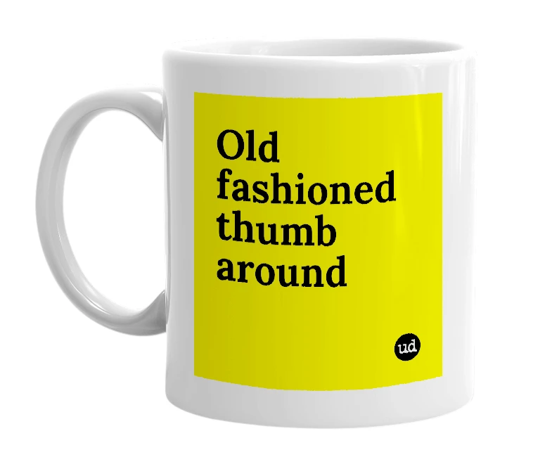 White mug with 'Old fashioned thumb around' in bold black letters