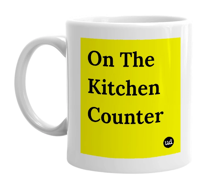 White mug with 'On The Kitchen Counter' in bold black letters