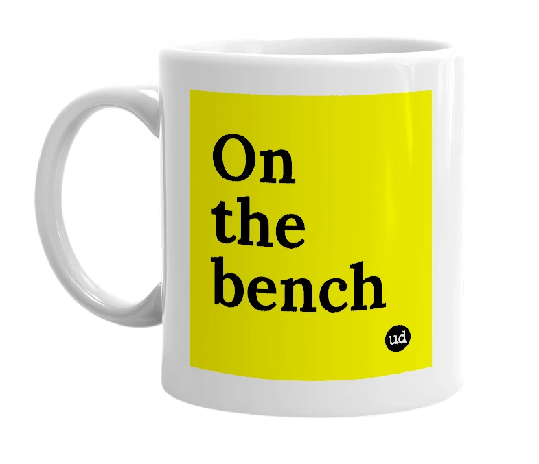White mug with 'On the bench' in bold black letters