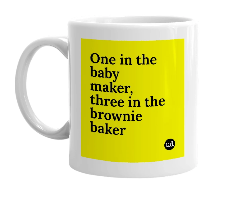 White mug with 'One in the baby maker, three in the brownie baker' in bold black letters