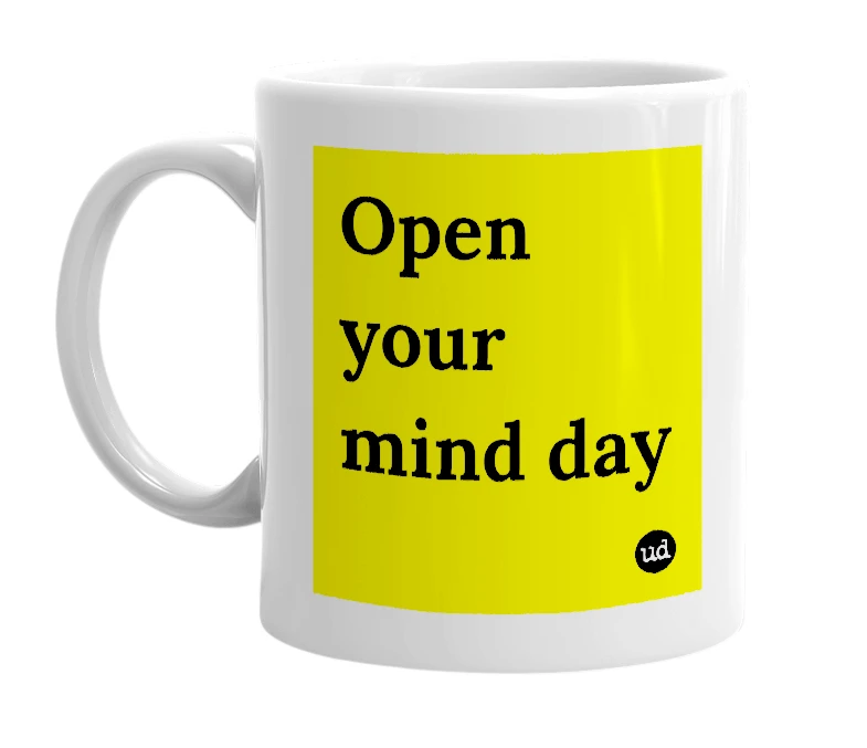White mug with 'Open your mind day' in bold black letters