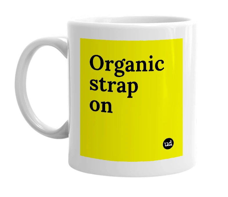 White mug with 'Organic strap on' in bold black letters