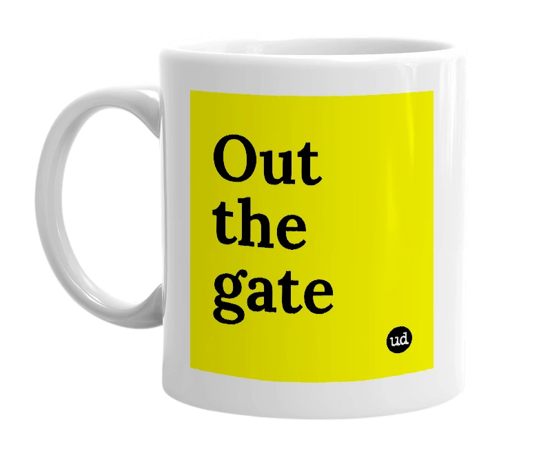 White mug with 'Out the gate' in bold black letters