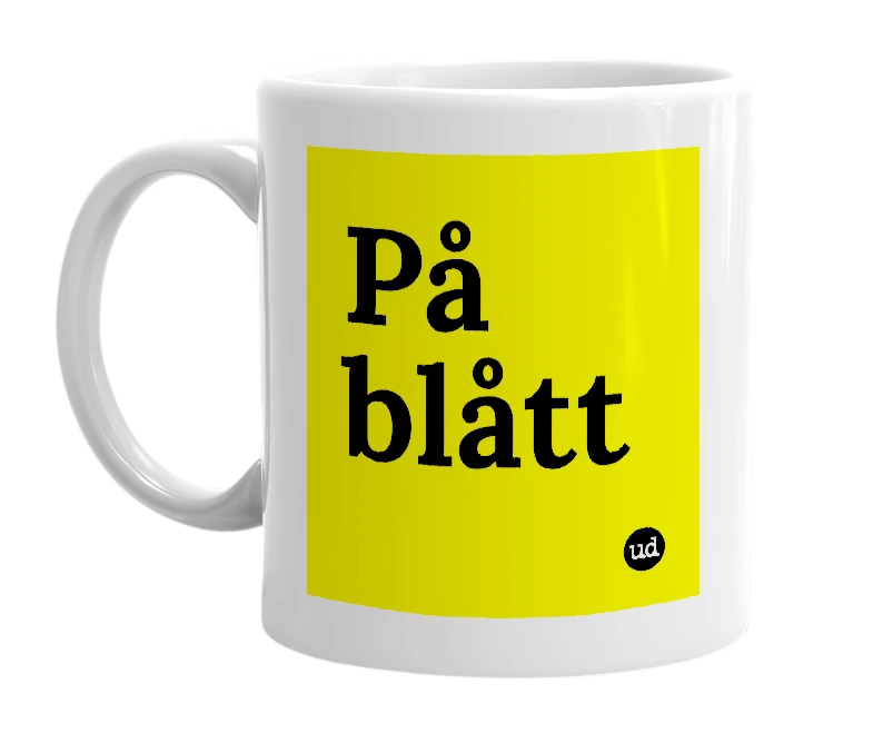 White mug with 'På blått' in bold black letters