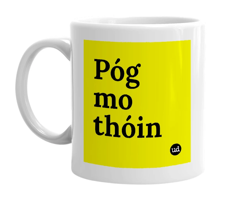 White mug with 'Póg mo thóin' in bold black letters