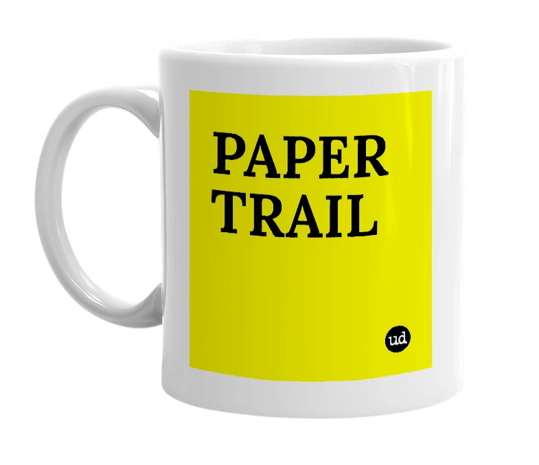 White mug with 'PAPER TRAIL' in bold black letters