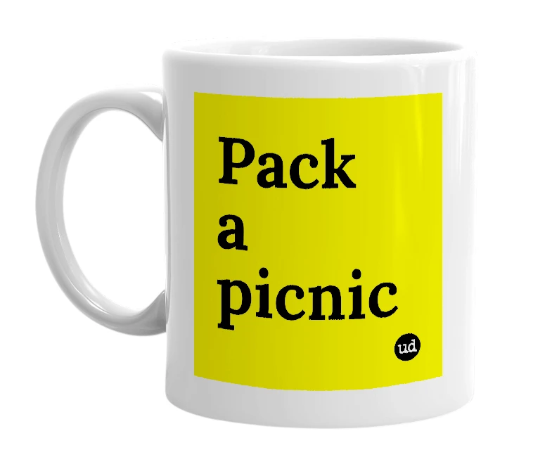 White mug with 'Pack a picnic' in bold black letters