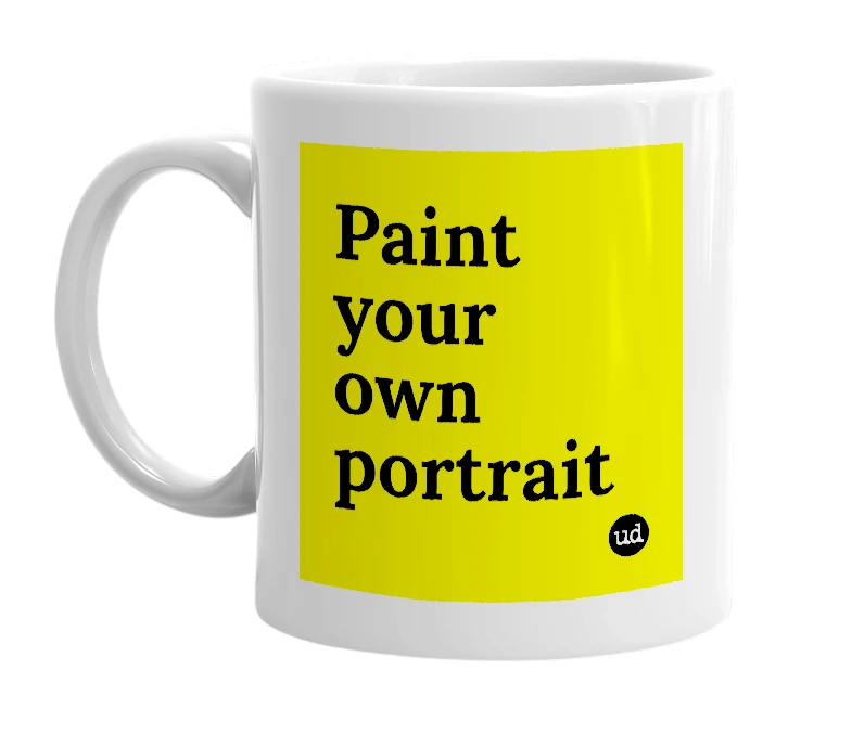 White mug with 'Paint your own portrait' in bold black letters