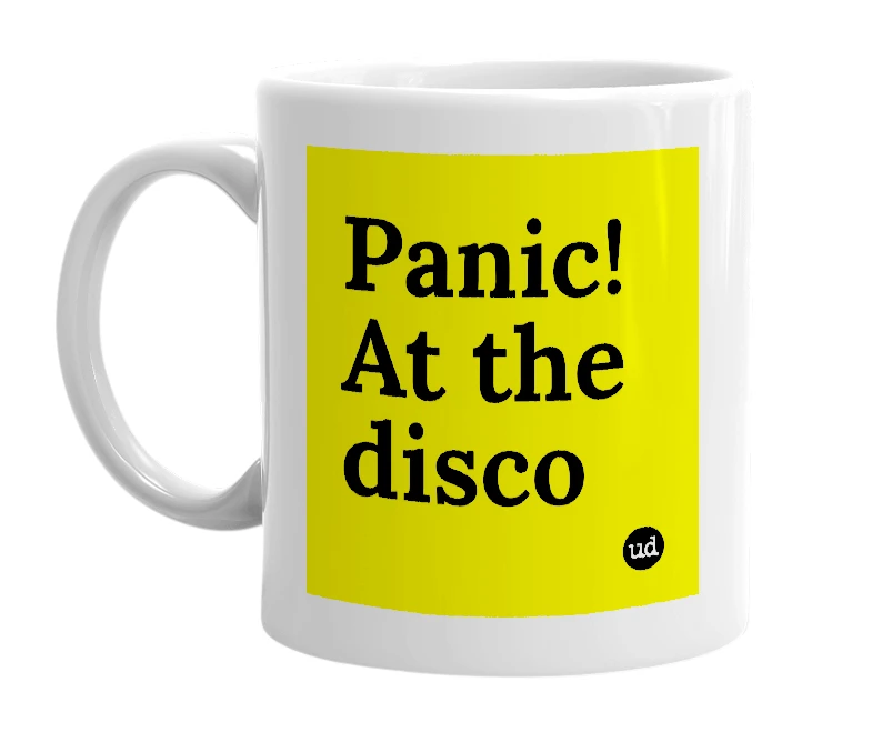 White mug with 'Panic! At the disco' in bold black letters