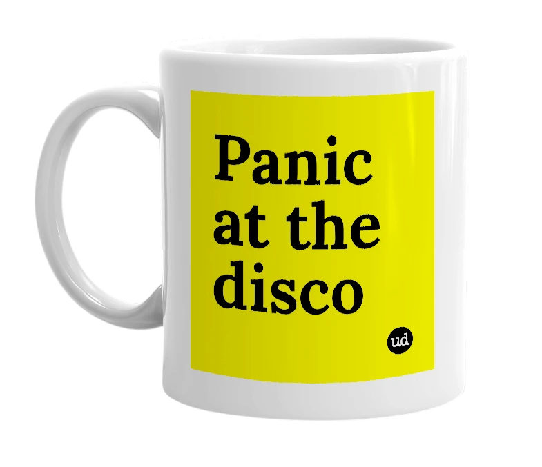 White mug with 'Panic at the disco' in bold black letters