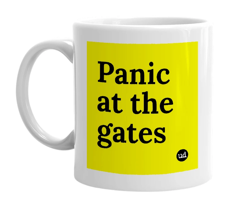 White mug with 'Panic at the gates' in bold black letters