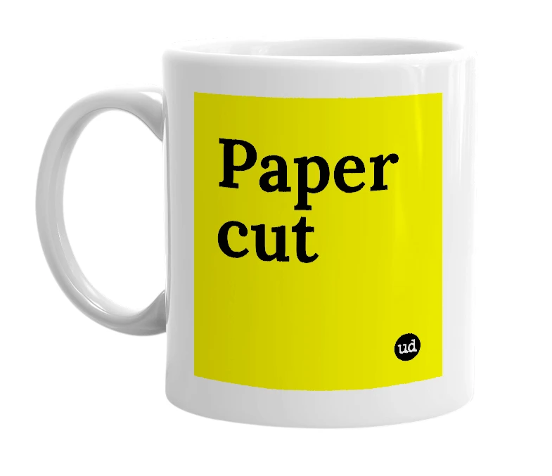 White mug with 'Paper cut' in bold black letters