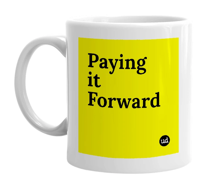 White mug with 'Paying it Forward' in bold black letters