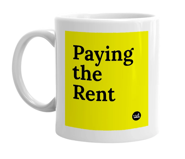 White mug with 'Paying the Rent' in bold black letters
