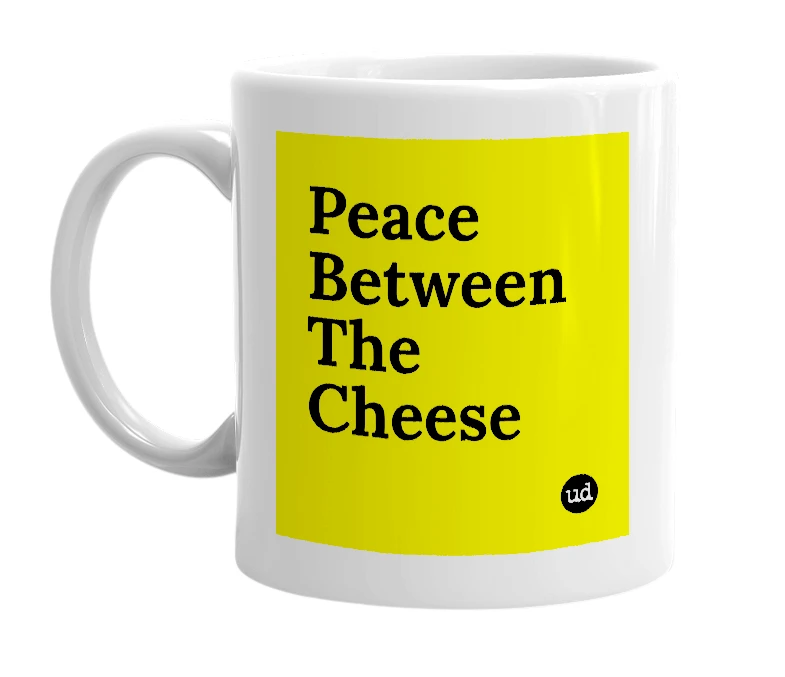 White mug with 'Peace Between The Cheese' in bold black letters