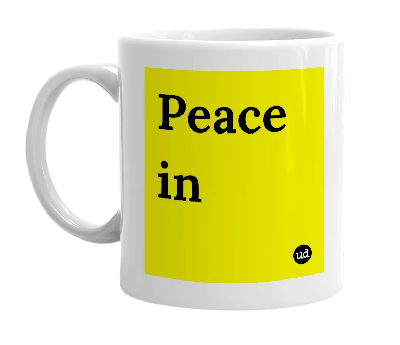 White mug with 'Peace in' in bold black letters