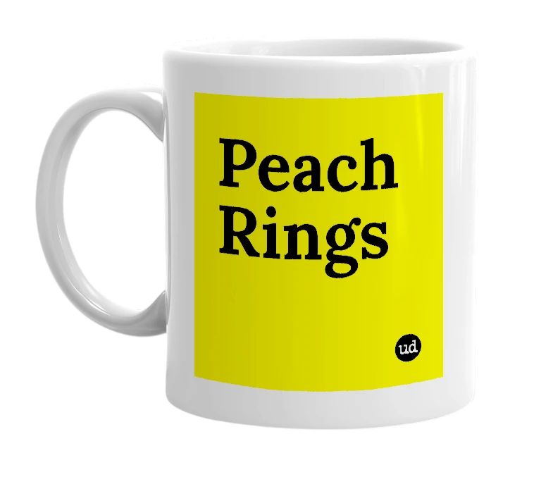 White mug with 'Peach Rings' in bold black letters