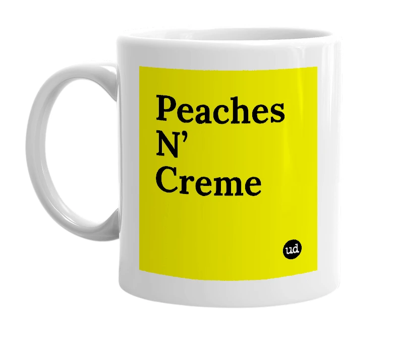 White mug with 'Peaches N’ Creme' in bold black letters