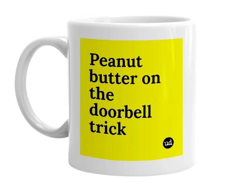 White mug with 'Peanut butter on the doorbell trick' in bold black letters