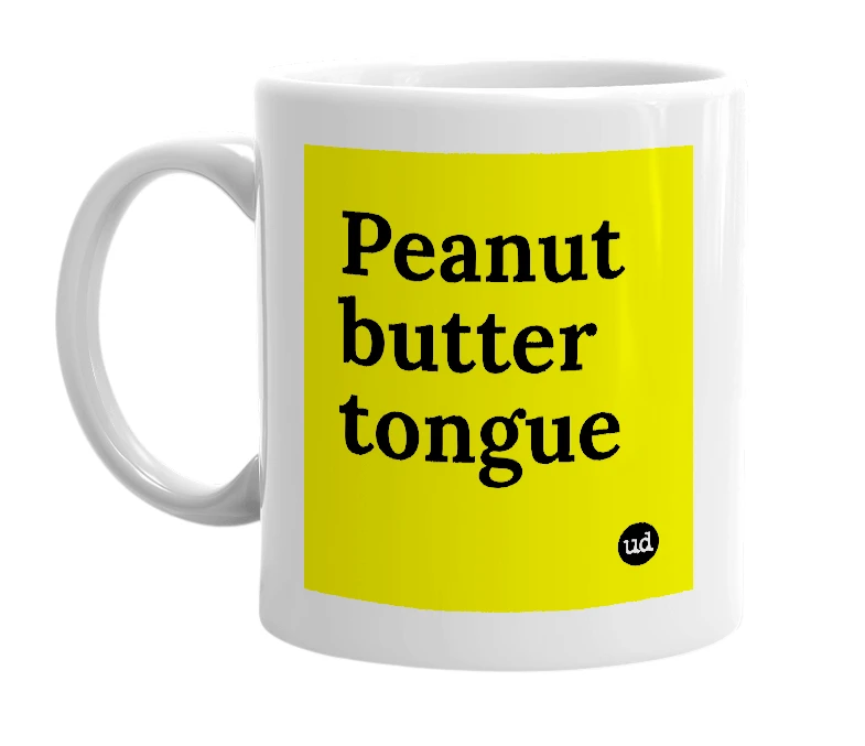 White mug with 'Peanut butter tongue' in bold black letters