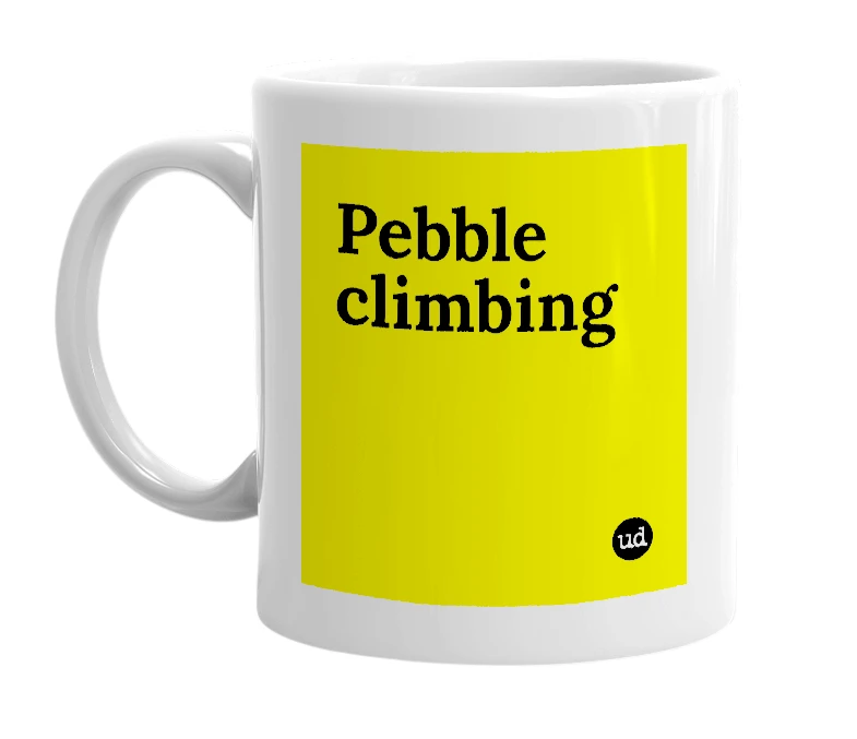 White mug with 'Pebble climbing' in bold black letters