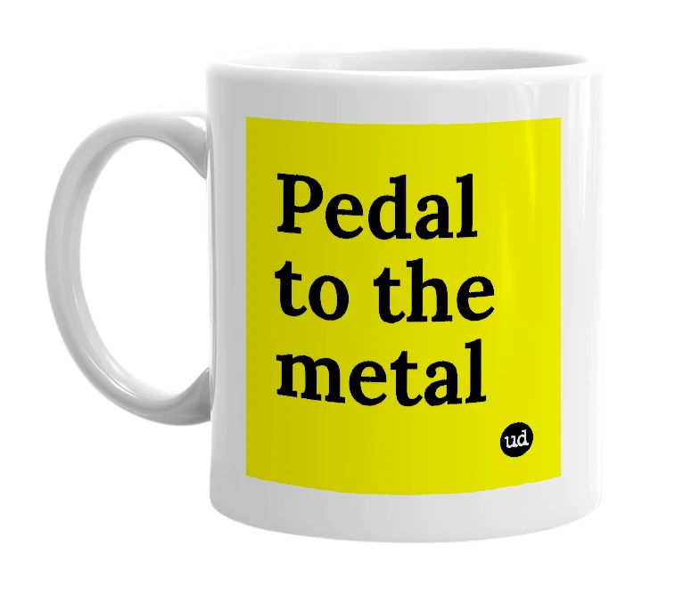 White mug with 'Pedal to the metal' in bold black letters