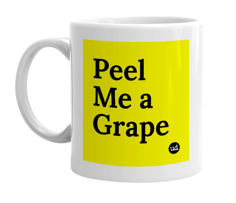 White mug with 'Peel Me a Grape' in bold black letters