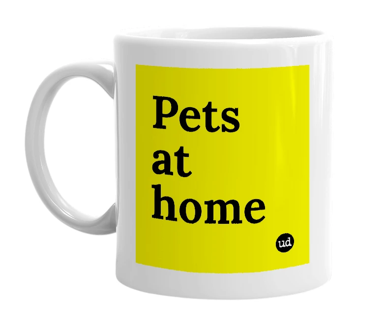 White mug with 'Pets at home' in bold black letters