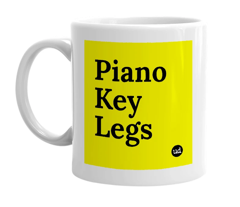 White mug with 'Piano Key Legs' in bold black letters