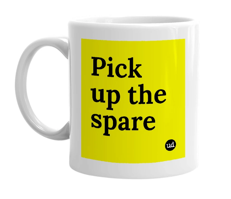 White mug with 'Pick up the spare' in bold black letters