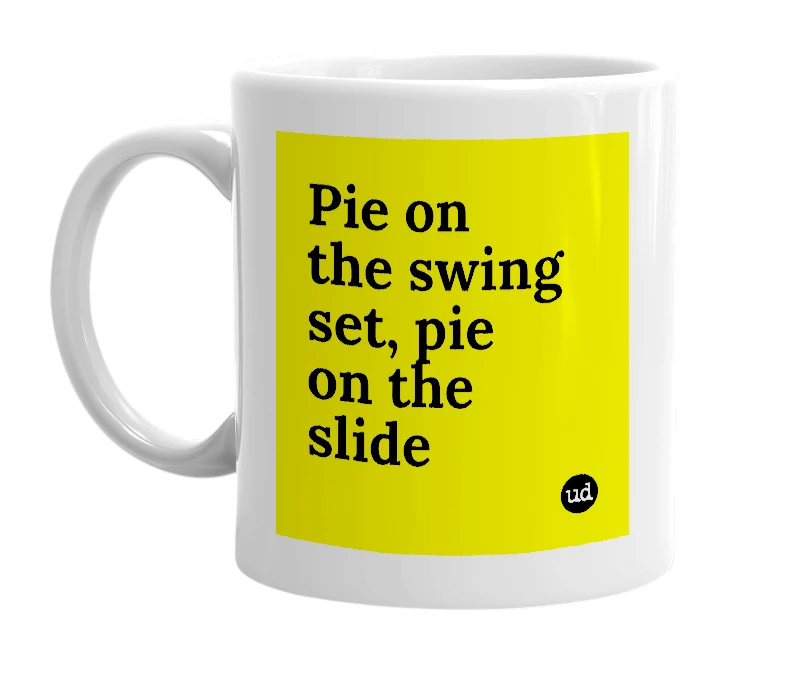 White mug with 'Pie on the swing set, pie on the slide' in bold black letters
