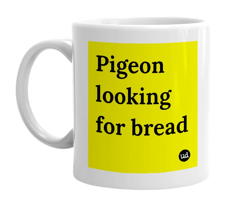White mug with 'Pigeon looking for bread' in bold black letters