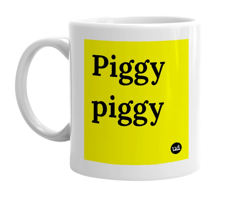 White mug with 'Piggy piggy' in bold black letters