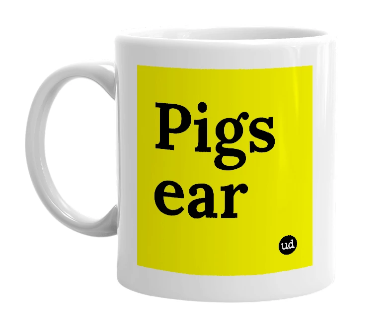 White mug with 'Pigs ear' in bold black letters