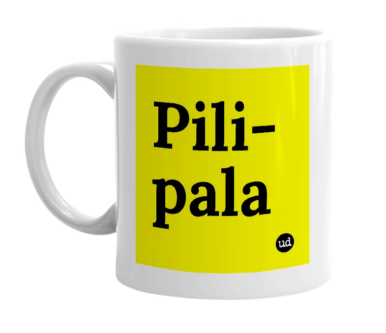 White mug with 'Pili-pala' in bold black letters