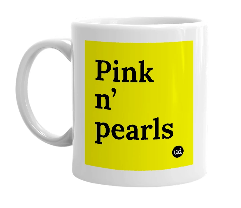 White mug with 'Pink n’ pearls' in bold black letters