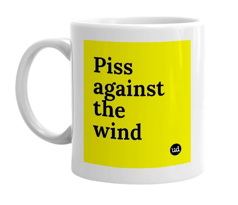 White mug with 'Piss against the wind' in bold black letters