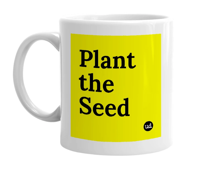 White mug with 'Plant the Seed' in bold black letters