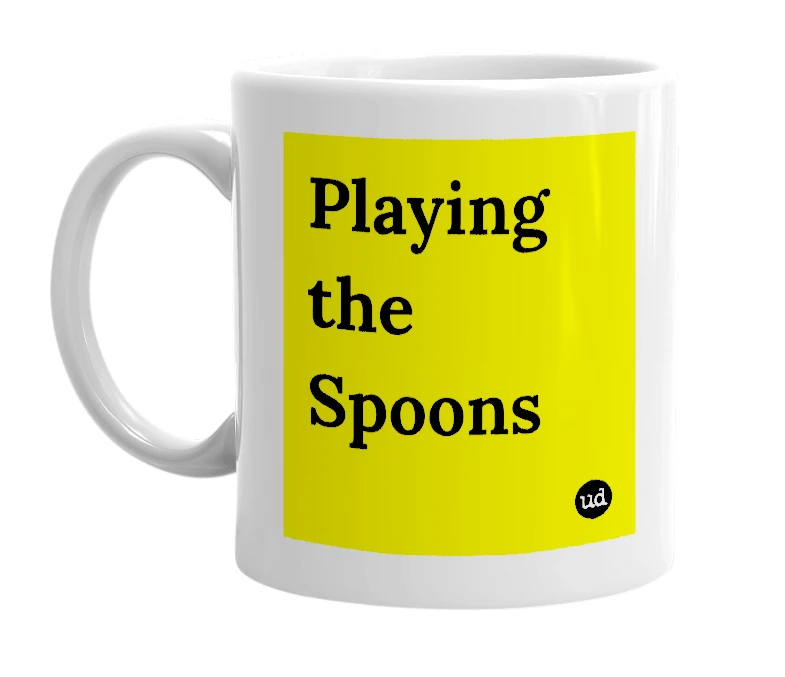 White mug with 'Playing the Spoons' in bold black letters