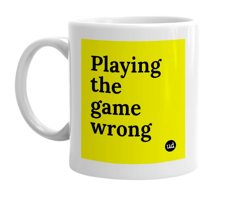 White mug with 'Playing the game wrong' in bold black letters