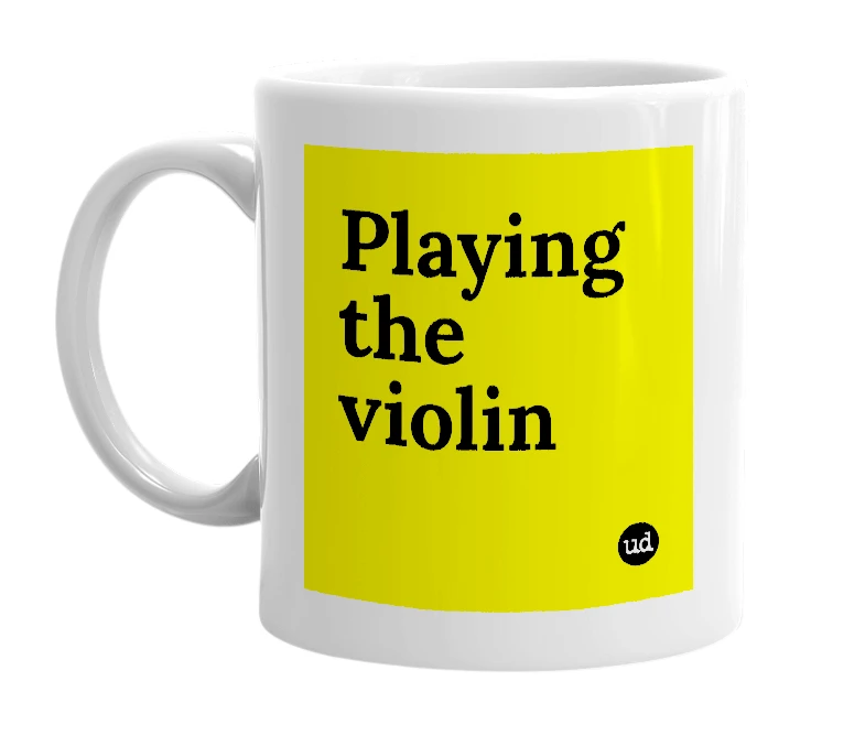 White mug with 'Playing the violin' in bold black letters