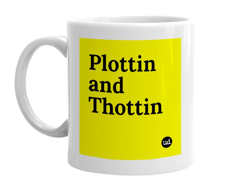 White mug with 'Plottin and Thottin' in bold black letters