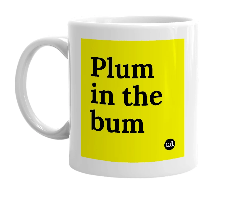 White mug with 'Plum in the bum' in bold black letters