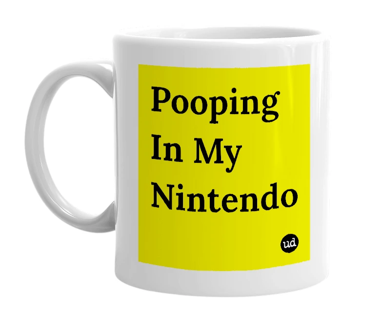 White mug with 'Pooping In My Nintendo' in bold black letters
